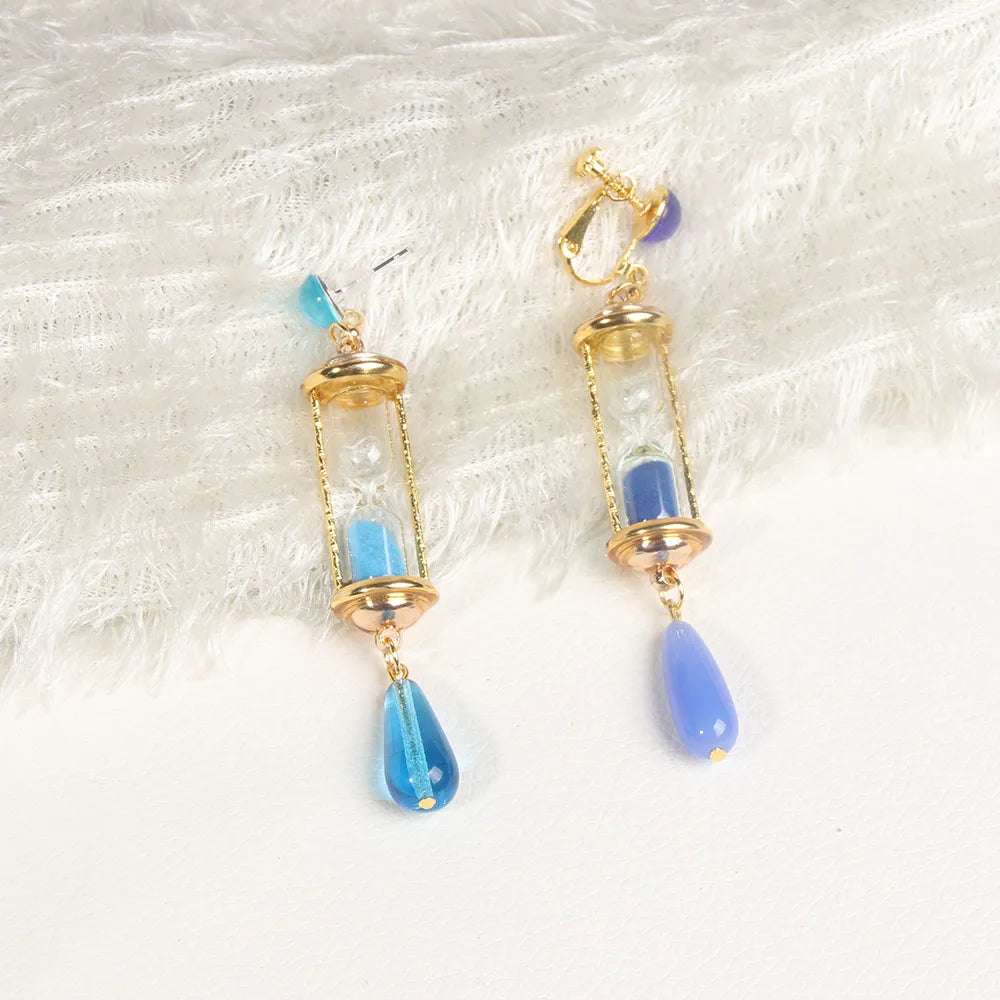 The Case Study of Vanitas Blue Hourglass Drop Earrings