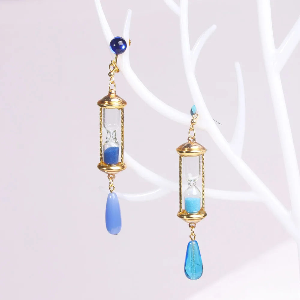 The Case Study of Vanitas Blue Hourglass Drop Earrings