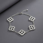 Black Encrusted Quatrefoil Motif Silver Bracelet