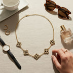 Black Encrusted Quatrefoil Motif Gold Necklace