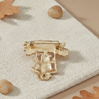 Brooch Merry Christmas Santa Swing Gold Pin